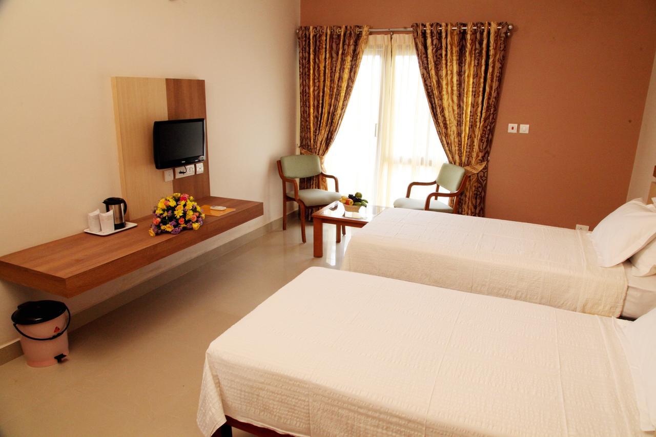 Hotel Polariz Parassinikkadavu Стая снимка
